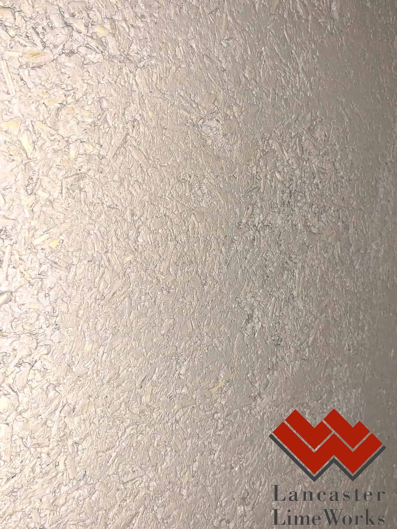 Close up of the Coarse Hemp Shiv plaster mix. Next step the finish coat!