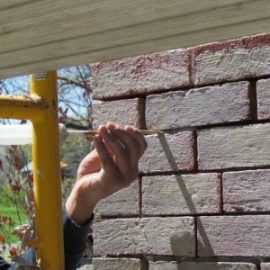 Fine Sand Lime Mortar repointing a butter joint with a syringe kit